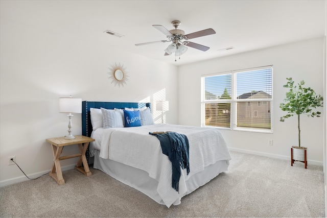 9747 Seed St, Ladson, SC 29456 - bedroom featuring baseboards, light colored carpet, and a ceiling fan