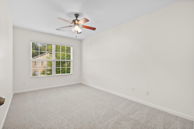 9747 Seed St, Ladson, SC 29456 - empty room with carpet floors, baseboards, and ceiling fan