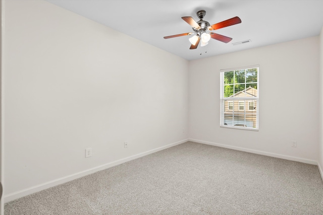 9747 Seed St, Ladson, SC 29456 - empty room with carpet flooring, baseboards, and ceiling fan