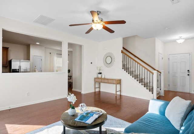 9747 Seed St, Ladson, SC 29456 - living area with a ceiling fan, stairs, wood finished floors, and baseboards