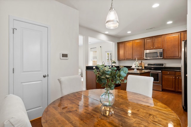 9747 Seed St, Ladson, SC 29456 - dining space featuring recessed lighting and dark wood-type flooring