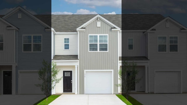 view of front of house with concrete driveway, board and batten siding, and an attached garage