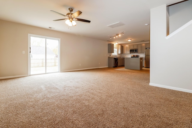 8285 Little Sydneys Way N, Charleston, SC 29406 - unfurnished living room featuring light colored carpet and ceiling fan