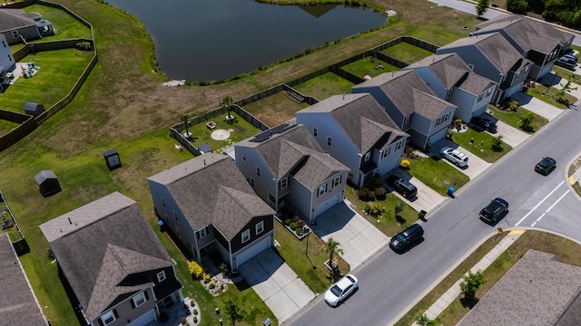 aerial perspective of suburban area featuring a large body of water