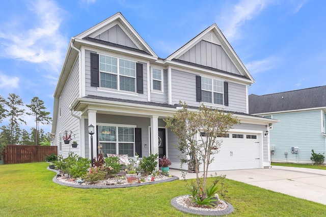 craftsman-style house with a garage, a front yard, and covered porch