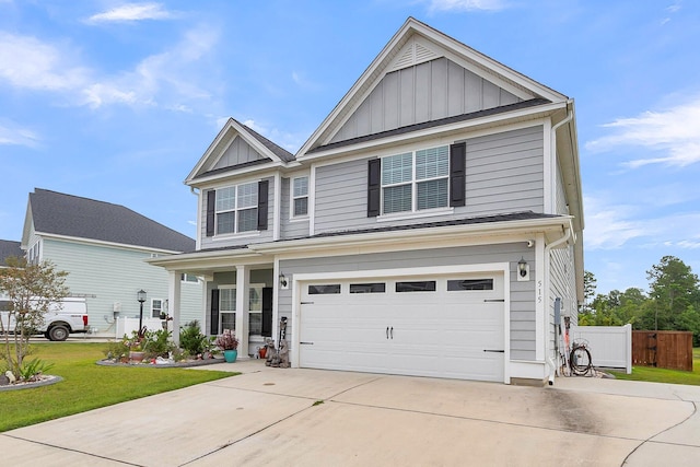 craftsman-style house with a garage and a front yard