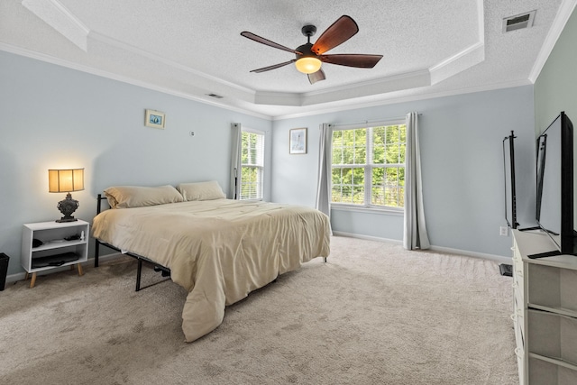 340 Stefan Dr, Charleston, SC 29412 - bedroom with a tray ceiling, ornamental molding, a textured ceiling, carpet floors, and a ceiling fan