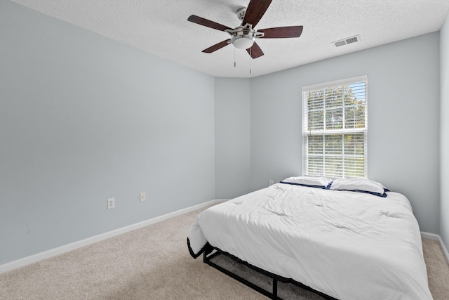 340 Stefan Dr, Charleston, SC 29412 - bedroom with carpet floors, a textured ceiling, and a ceiling fan