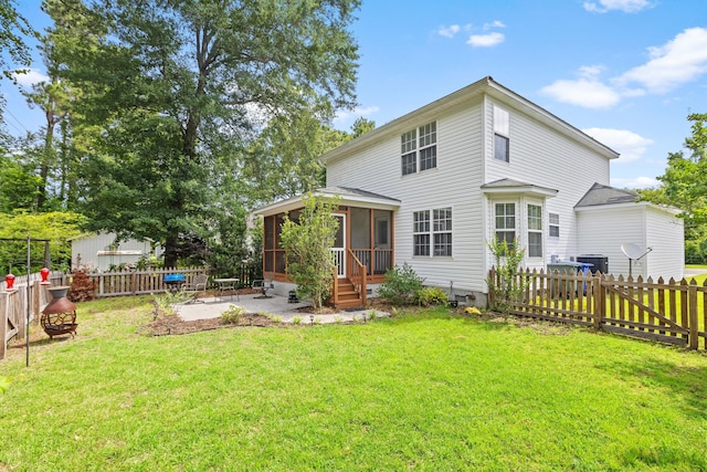 340 Stefan Dr, Charleston, SC 29412 - rear view of house with a sunroom, a patio, and a fenced backyard