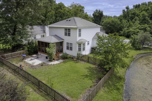 340 Stefan Dr, Charleston, SC 29412 - rear view of house with a sunroom, a patio, a shingled roof, and a fenced backyard