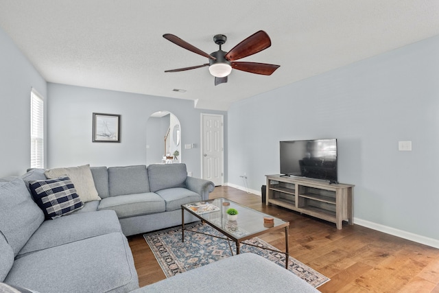 340 Stefan Dr, Charleston, SC 29412 - living area with a ceiling fan, arched walkways, and wood finished floors