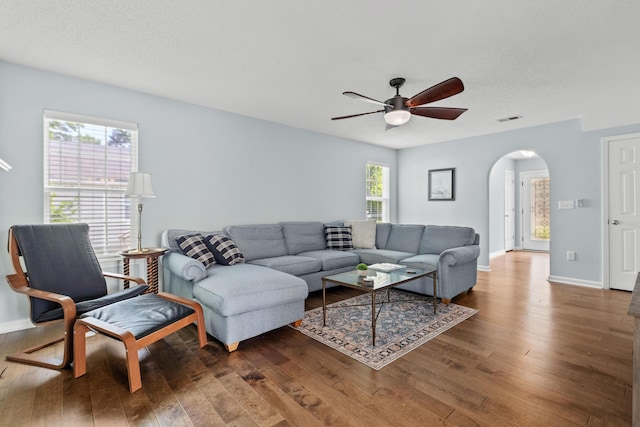 340 Stefan Dr, Charleston, SC 29412 - living area with arched walkways, wood finished floors, and a ceiling fan