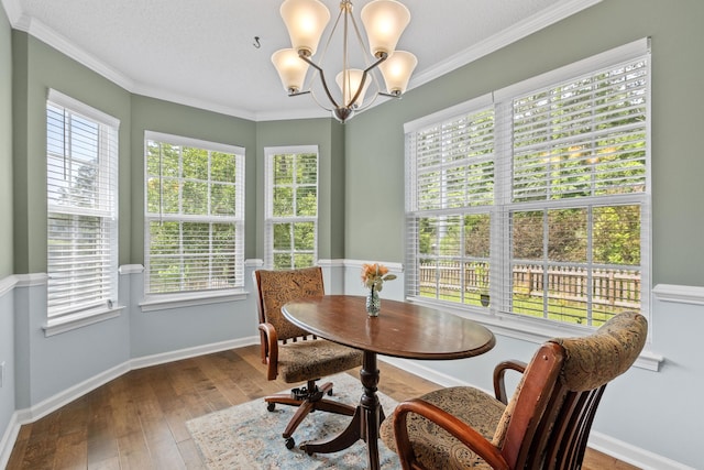 340 Stefan Dr, Charleston, SC 29412 - dining area with a chandelier, wood-type flooring, and ornamental molding