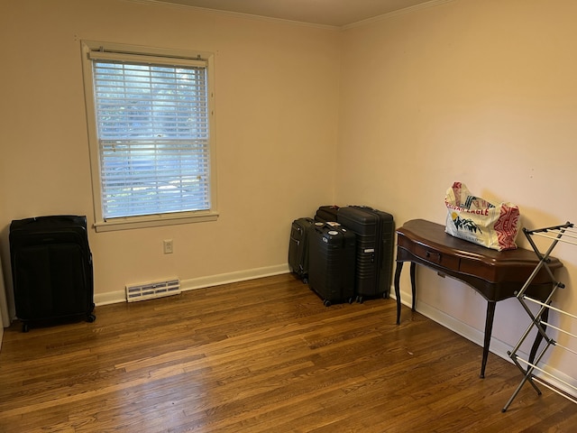 misc room featuring dark hardwood / wood-style flooring and ornamental molding