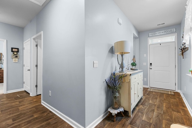 foyer featuring dark wood-type flooring