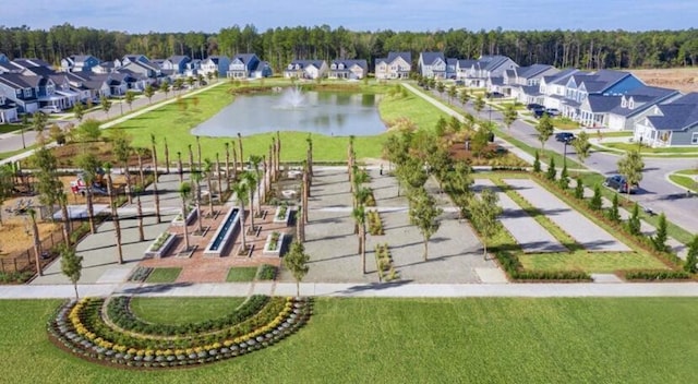 aerial view with a water view and a residential view