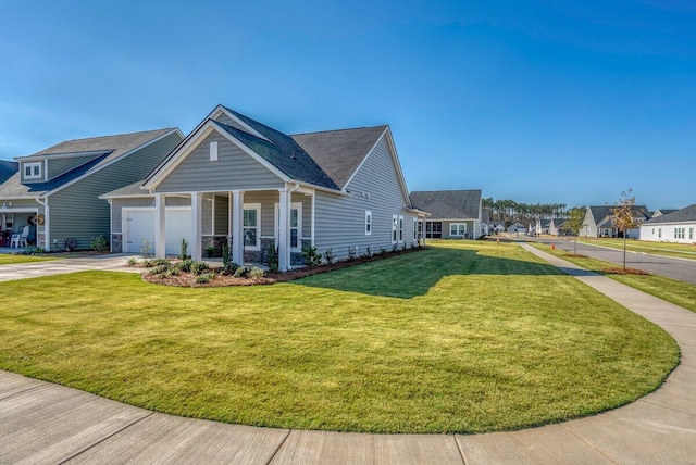 view of front of property featuring a garage and a front lawn