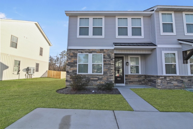 view of front of home featuring a front lawn