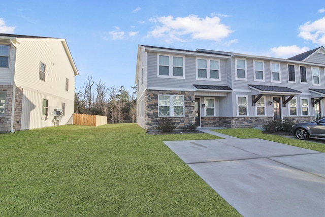 view of front of home with a front lawn