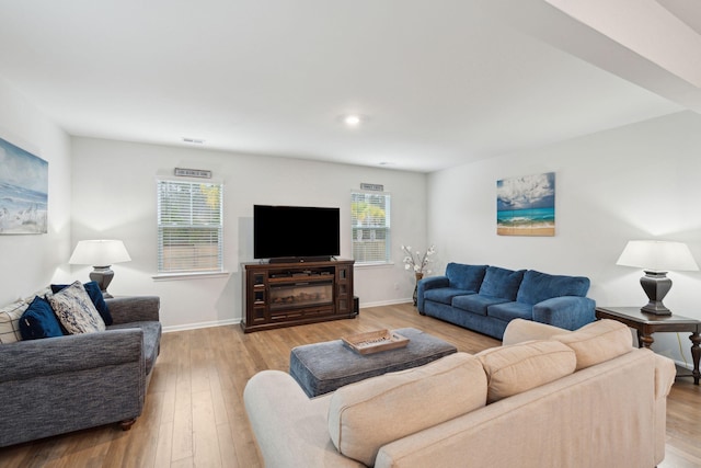 living room with light hardwood / wood-style floors