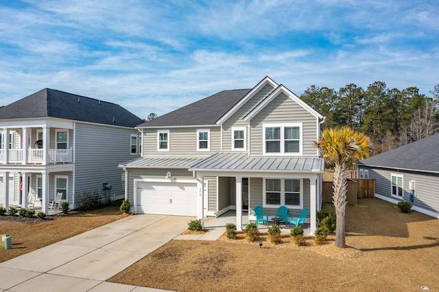 view of front of house with a porch and a garage