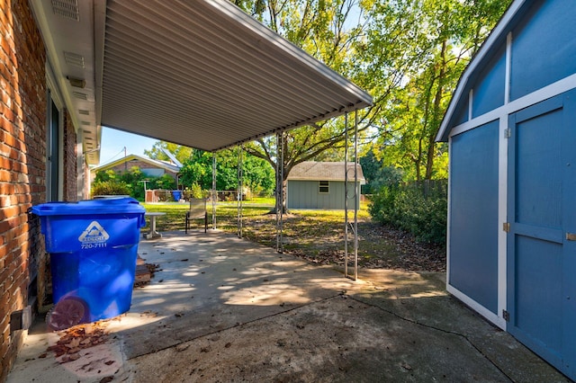 view of patio / terrace featuring a storage unit