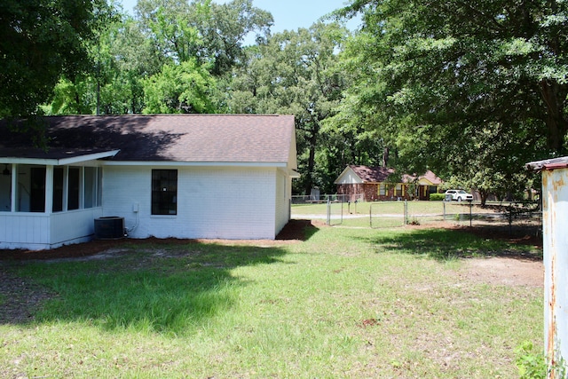 view of yard featuring central AC unit
