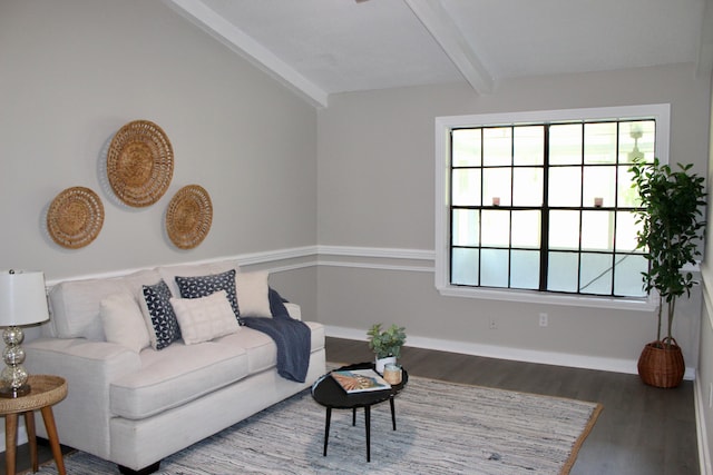 living room featuring wood finished floors and baseboards