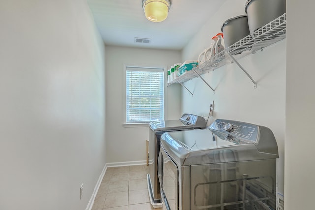 2150 Terrabrook Ln, Charleston, SC 29412 - laundry area with washer and dryer and light tile patterned floors