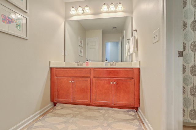 2150 Terrabrook Ln, Charleston, SC 29412 - bathroom featuring double vanity and baseboards