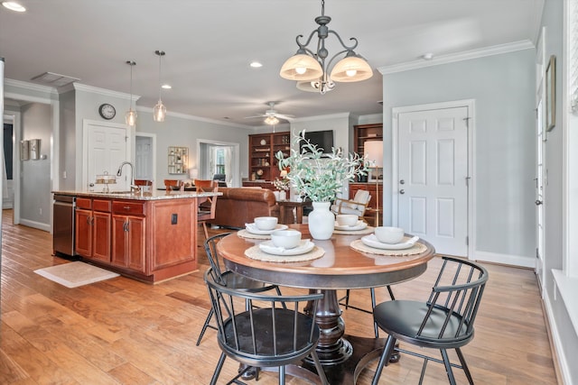 129 Saluda Dr, Moncks Corner, SC 29461 - dining area with ceiling fan, light wood-style flooring, ornamental molding, and recessed lighting