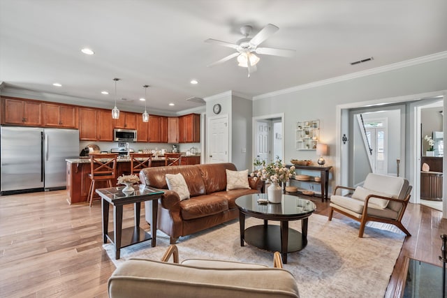 129 Saluda Dr, Moncks Corner, SC 29461 - living room with crown molding, recessed lighting, light wood-style floors, and ceiling fan