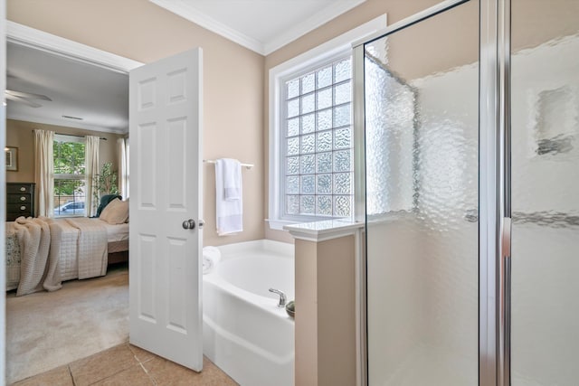 129 Saluda Dr, Moncks Corner, SC 29461 - bathroom featuring ensuite bath, a bath, a shower stall, crown molding, and tile patterned flooring