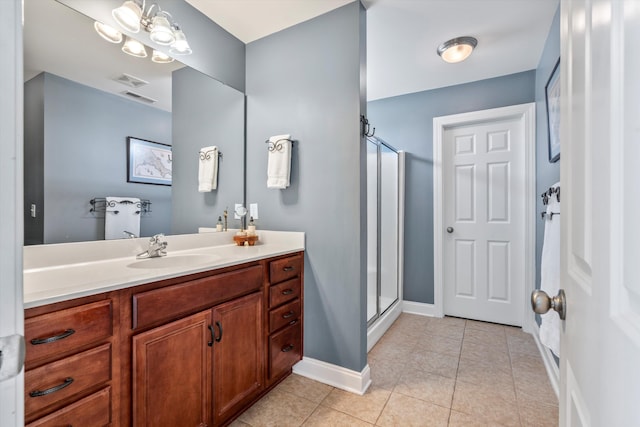 129 Saluda Dr, Moncks Corner, SC 29461 - bathroom with vanity, a stall shower, and tile patterned flooring