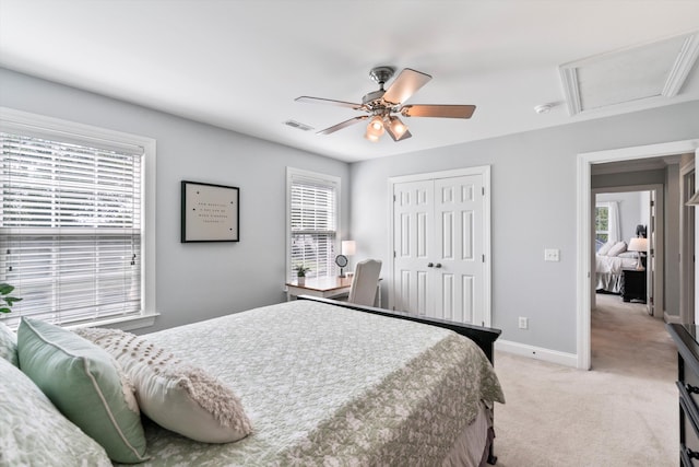129 Saluda Dr, Moncks Corner, SC 29461 - bedroom with light carpet, a closet, and ceiling fan