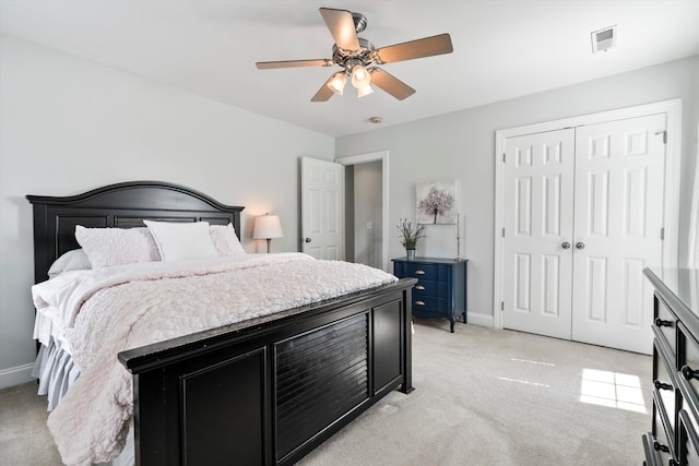 129 Saluda Dr, Moncks Corner, SC 29461 - bedroom featuring light colored carpet, a closet, and ceiling fan