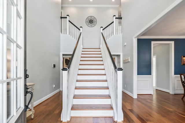 129 Saluda Dr, Moncks Corner, SC 29461 - stairway with wood finished floors, crown molding, and a high ceiling