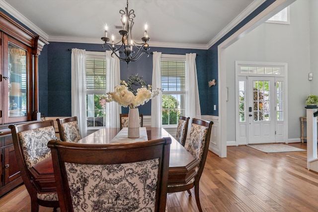 129 Saluda Dr, Moncks Corner, SC 29461 - dining room featuring a chandelier, wood finished floors, and ornamental molding