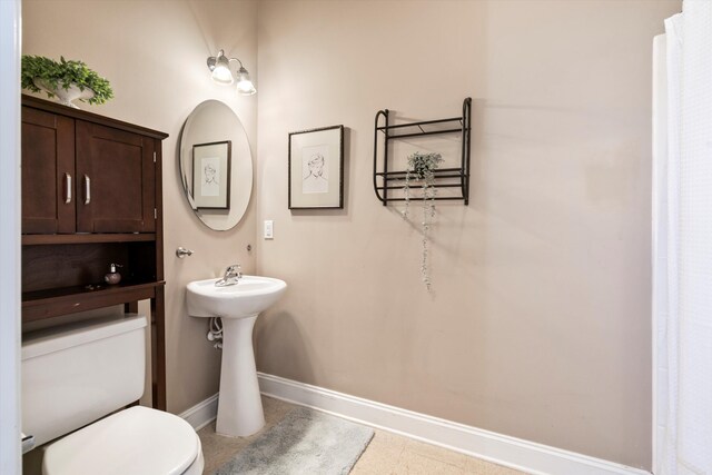129 Saluda Dr, Moncks Corner, SC 29461 - bathroom with baseboards and toilet