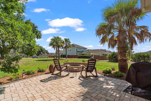 129 Saluda Dr, Moncks Corner, SC 29461 - view of patio / terrace featuring grilling area, a fire pit, and a residential view