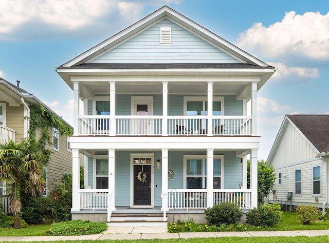 4953 W Liberty Park Cir N, Charleston, SC 29405 - view of front facade featuring a balcony and covered porch