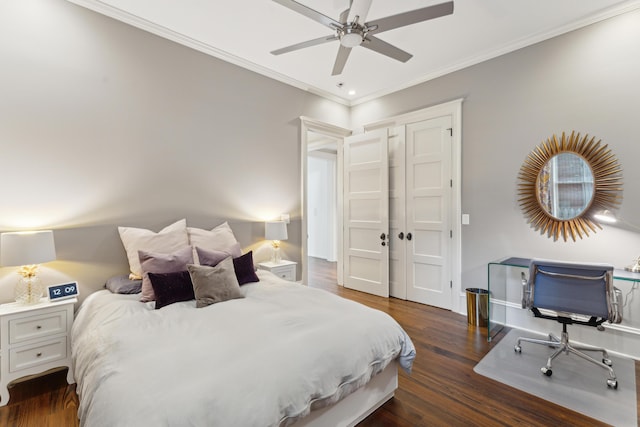 bedroom with crown molding, ceiling fan, and dark hardwood / wood-style flooring