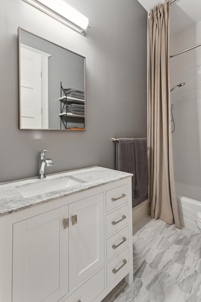 full bathroom featuring toilet, vanity, and shower / bathtub combination with curtain