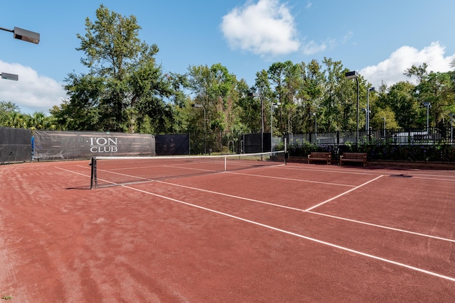 view of sport court featuring basketball hoop