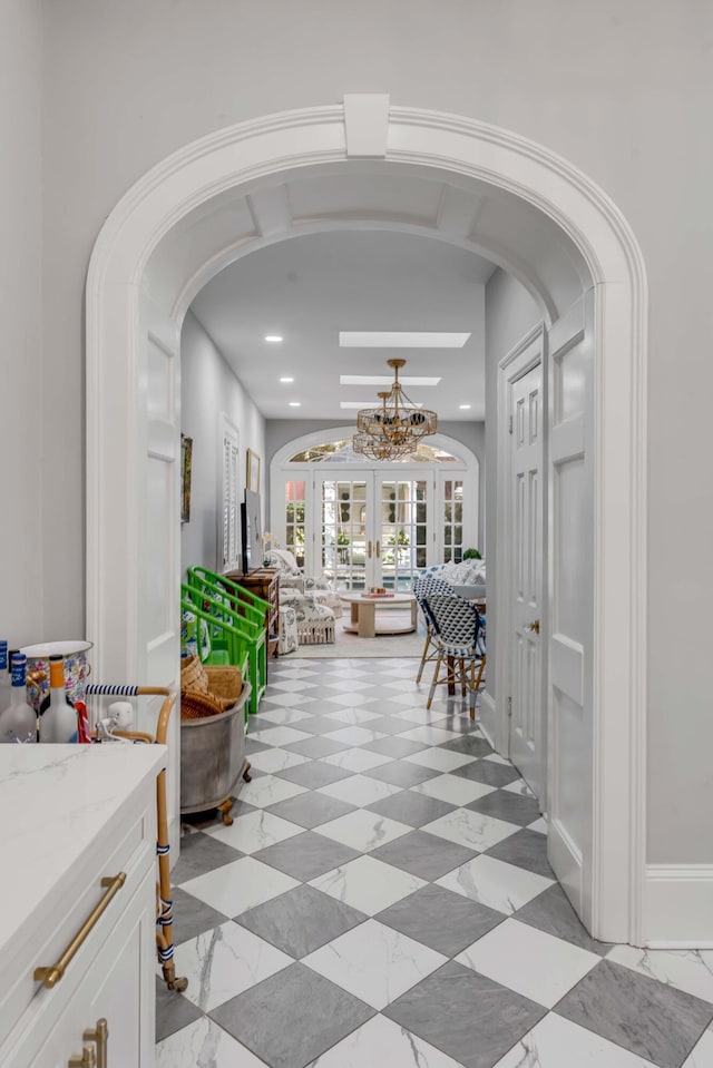 corridor featuring french doors