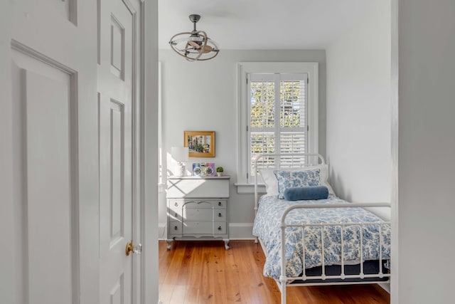 bedroom featuring hardwood / wood-style floors