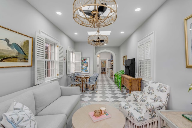 living room featuring a chandelier