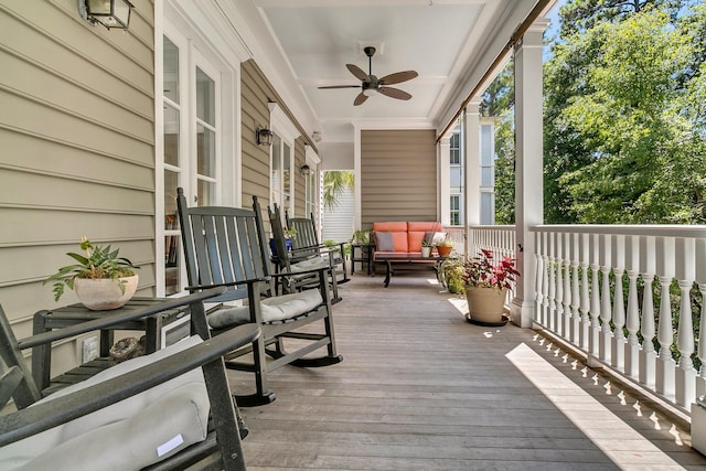 wooden terrace with ceiling fan