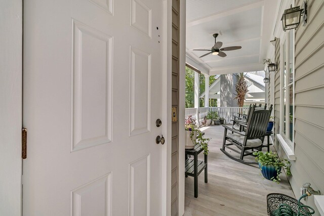 entryway with ceiling fan and light wood-type flooring