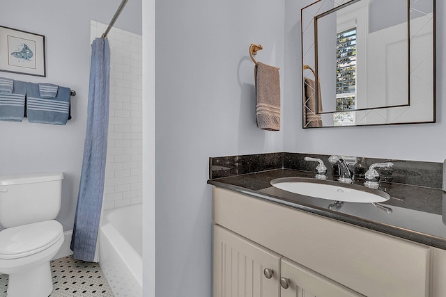 full bathroom with tile flooring, shower / bath combo, toilet, and vanity